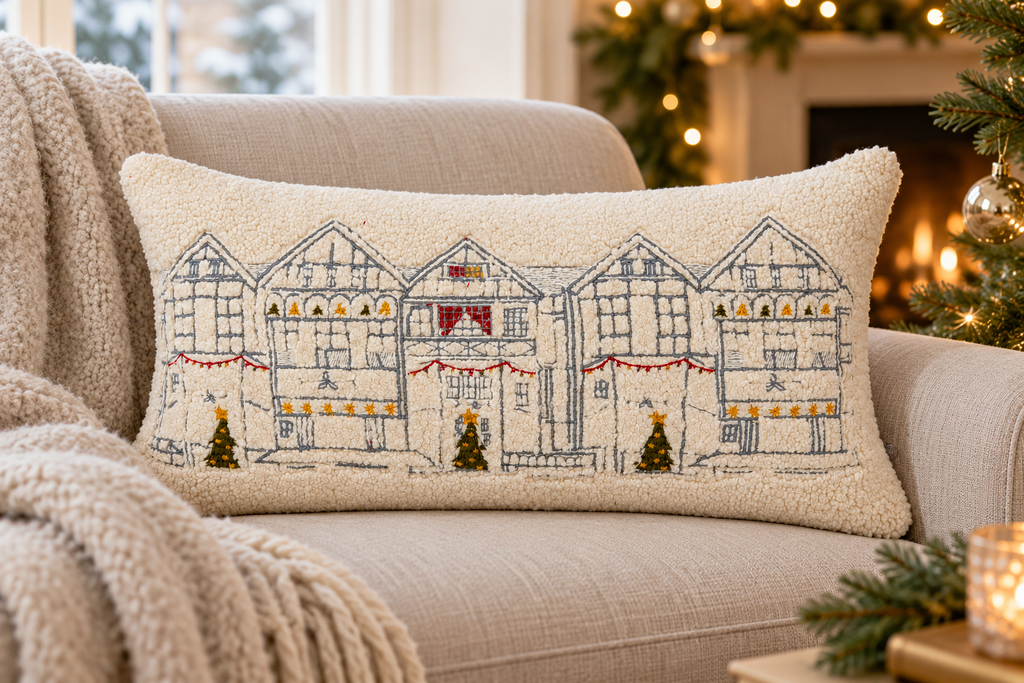 Snowy Christmas High Street Lumbar Cushion styled in a festive living room